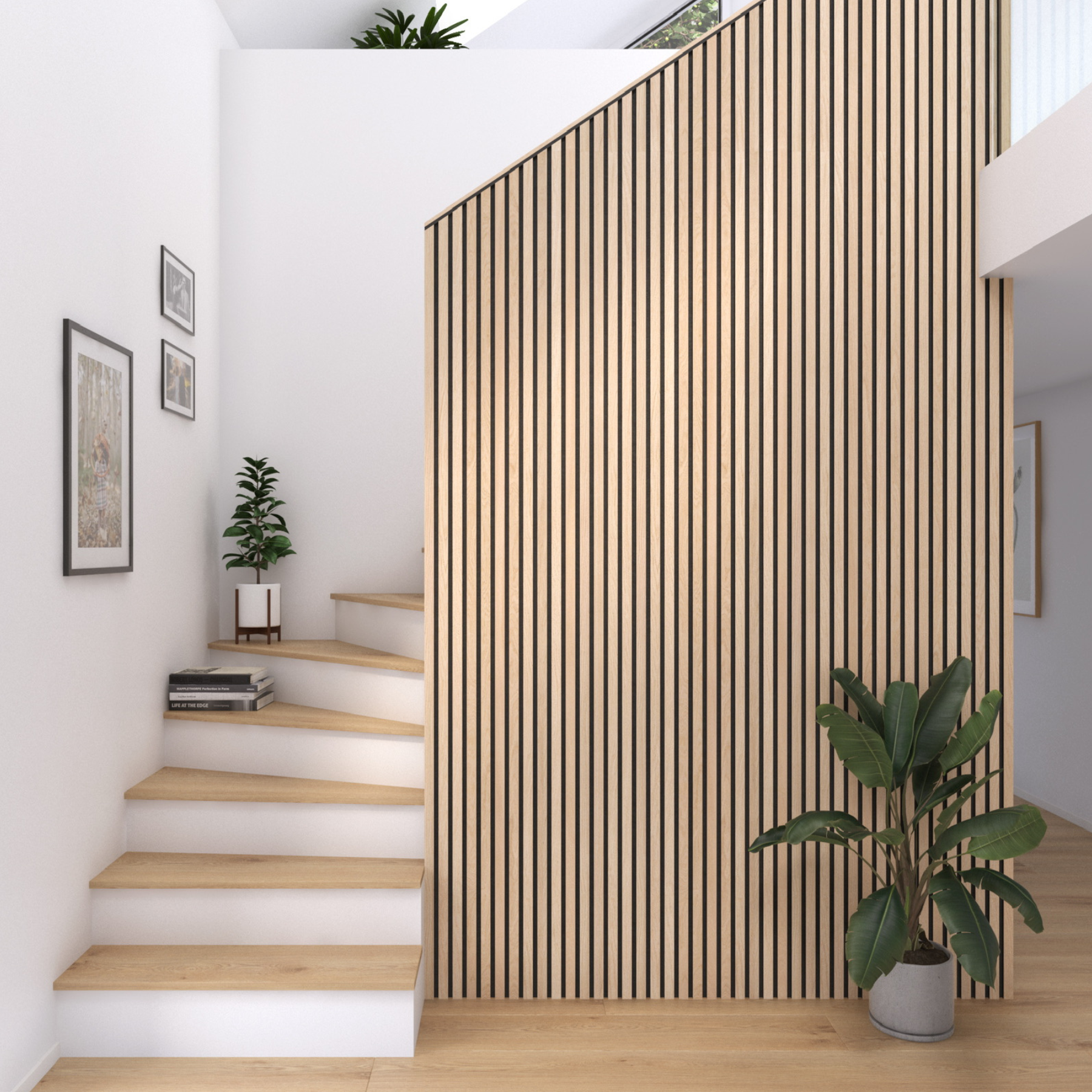 Vertical installation photo of light oak slat wall on staircase.